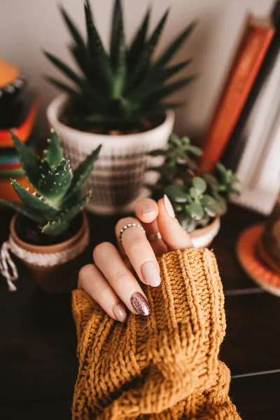 Luxury pedicure with glitter autumn nail design