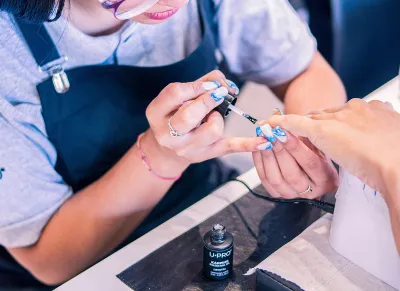 April providing BIAB nail treatment