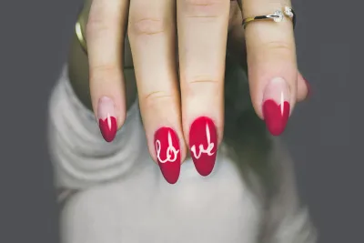 BIAB nail strengthening treatment with red polish