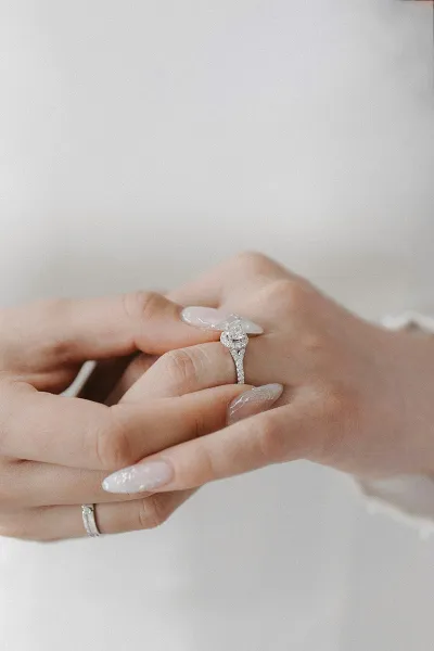 Subtle wedding nail art with pearl accents
